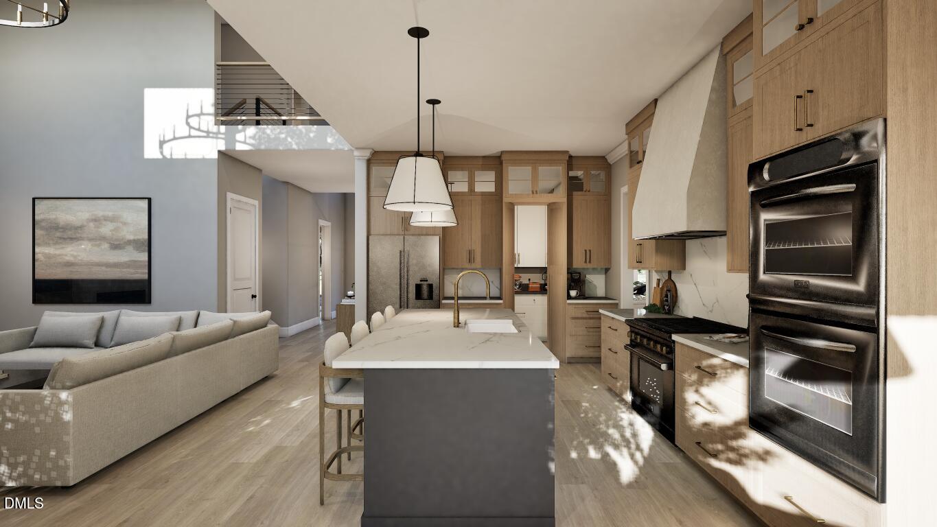 7613 Thompson Mill Road Wake Forest, NC 27587 - Photo 3 of 20 a large living room with stainless steel appliances kitchen island granite countertop furniture and a flat screen tv