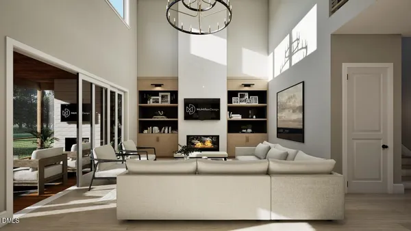 a living room with furniture kitchen view and large window