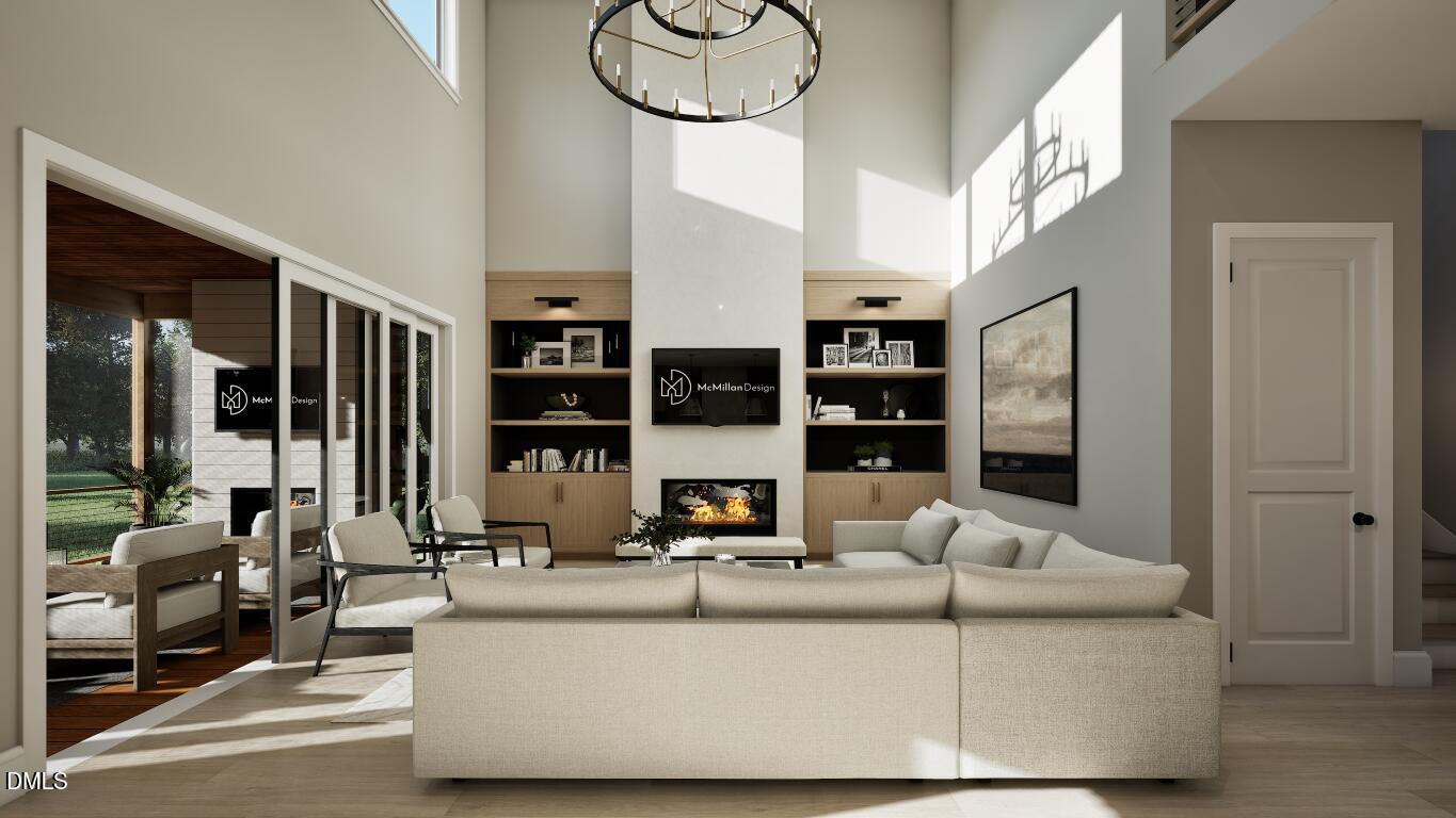 7613 Thompson Mill Road Wake Forest, NC 27587 - Photo 5 of 20 a living room with furniture kitchen view and large window