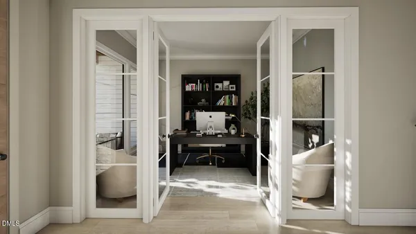 a bedroom with a bed and glass door