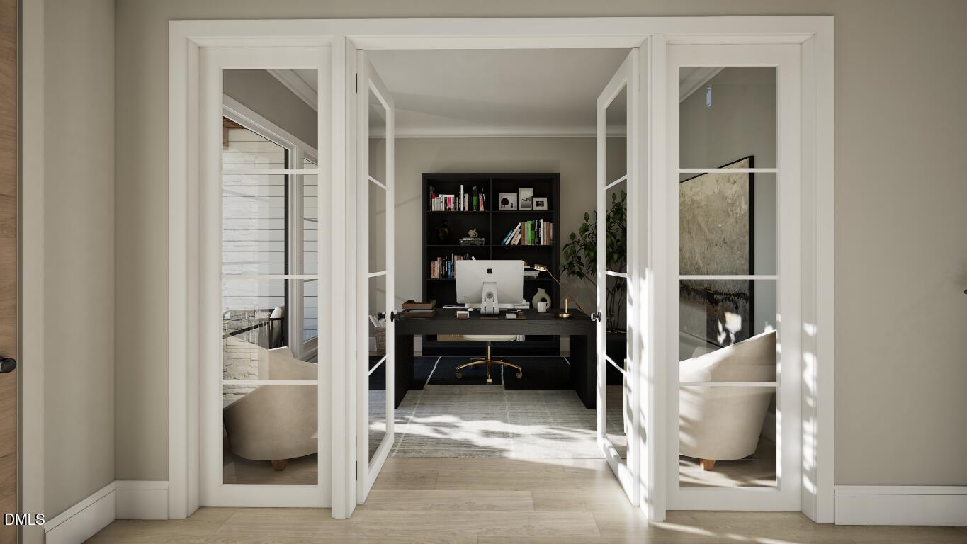 7613 Thompson Mill Road Wake Forest, NC 27587 - Photo 7 of 20 a bedroom with a bed and glass door