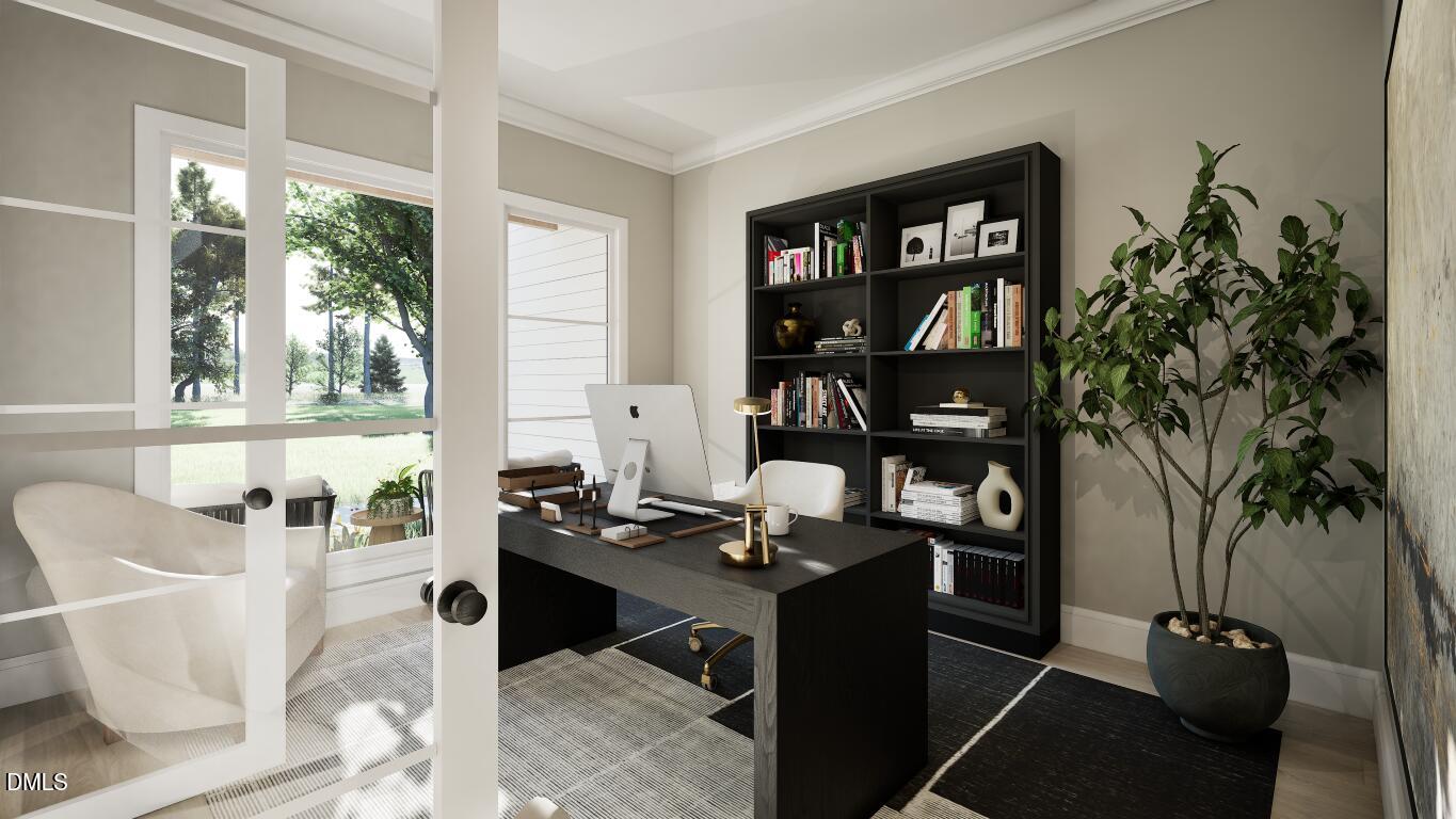7613 Thompson Mill Road Wake Forest, NC 27587 - Photo 8 of 20 a work room with furniture and a potted plant