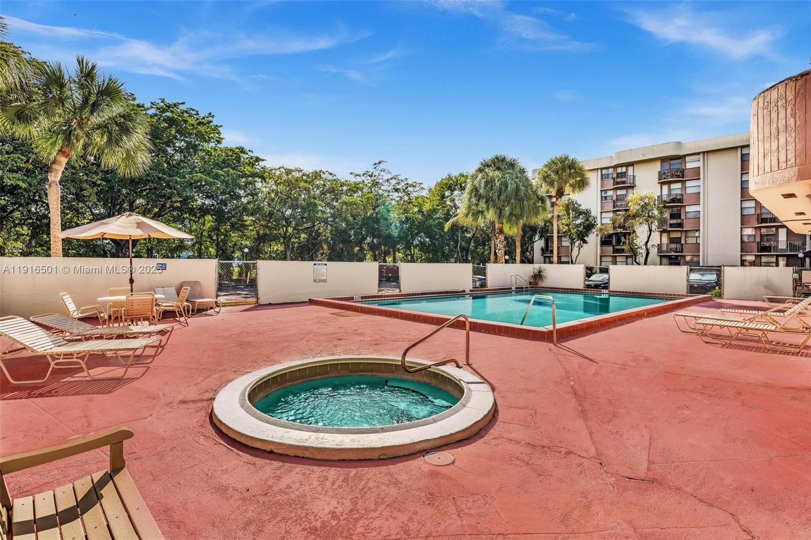 2701 Riverside Drive, Unit 303B Coral Springs, FL 33065 - Photo 17 of 19 a view of outdoor space yard and patio