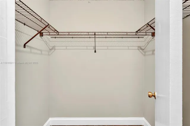 a view of a room with racks on the wall