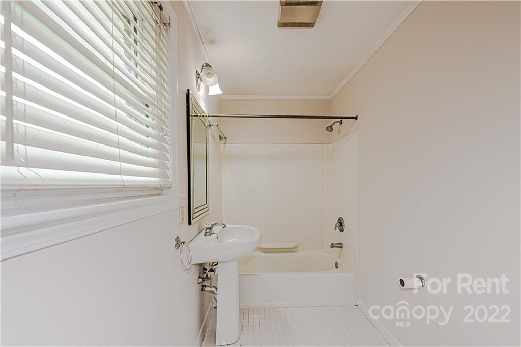 4301 Applegate Road Charlotte, NC 28209 - Photo 14 of 21 a bathroom with a shower