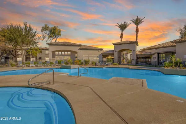 a view of a house with a swimming pool