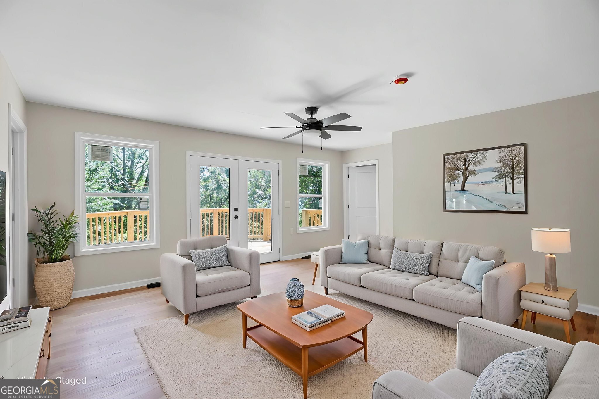 7060 Scenic Heights Road Manchester, GA 31816 - Photo 29 of 52 a living room with furniture and a large window