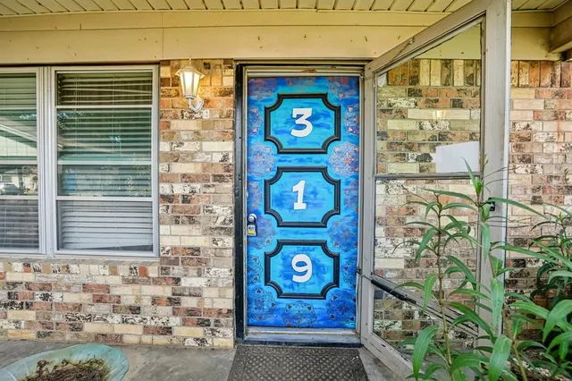 a view of a door door of the house