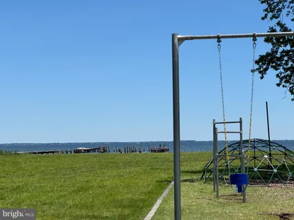 a view of a lake with a big yard