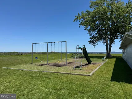 a view of a garden with a slide