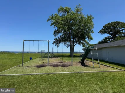 a view of a park with a slide
