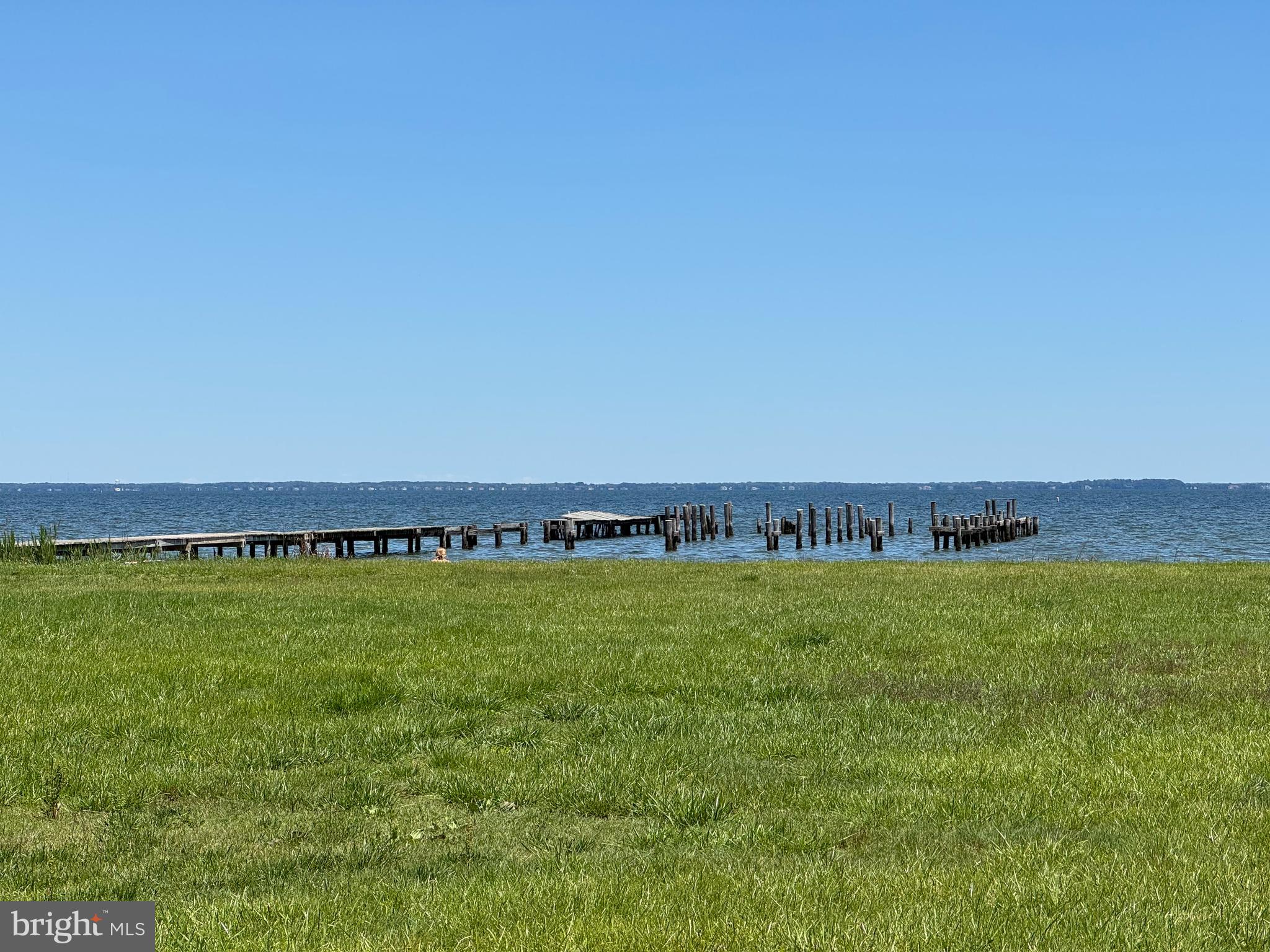 0 Ackerman Drive Stevensville, MD 21666 - Photo 8 of 17 a view of a field with an ocean