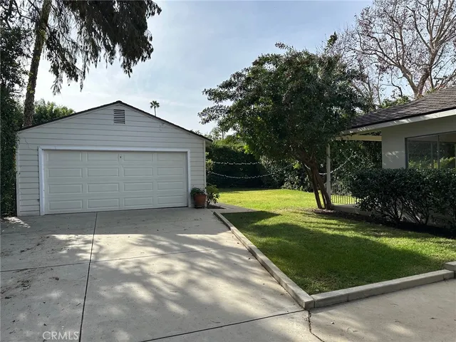 a front view of a house with yard