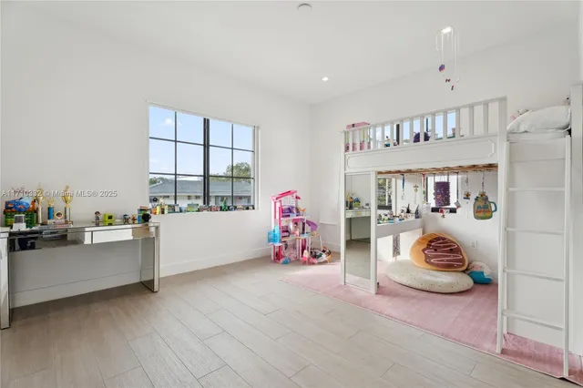 a bathroom with a double vanity sink toilet and shower