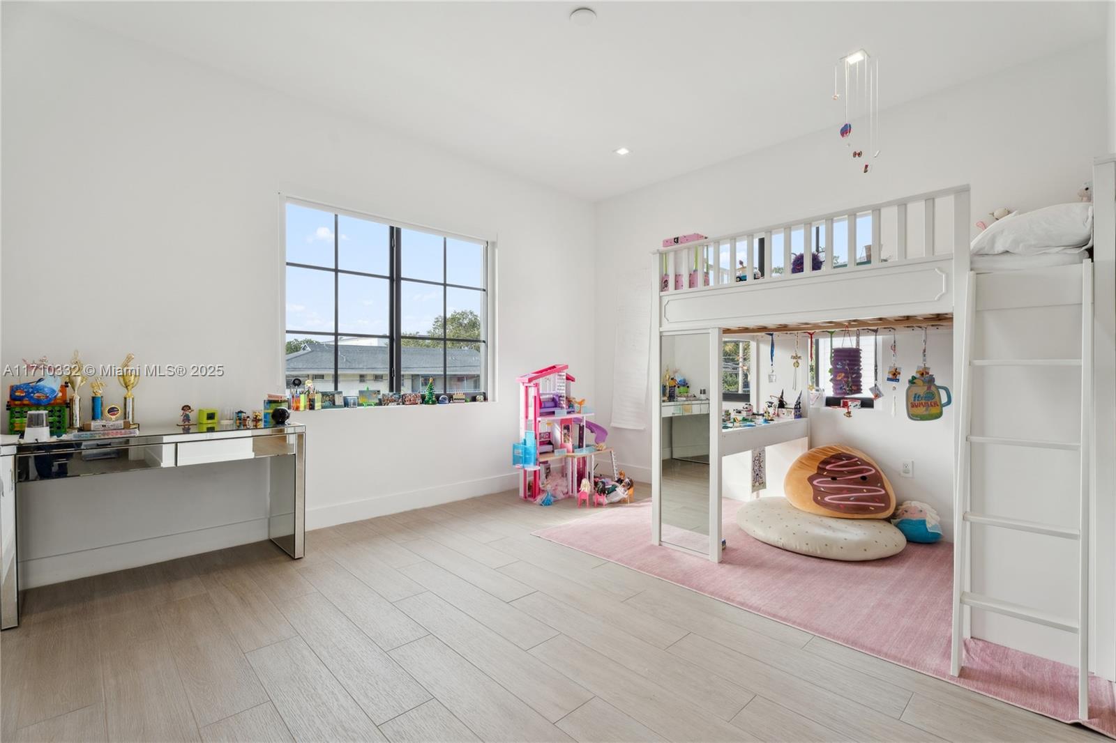 8391 Southwest 65th Avenue, Unit 8391 Miami, FL 33143 - Photo 20 of 24 a bedroom with furniture and a window