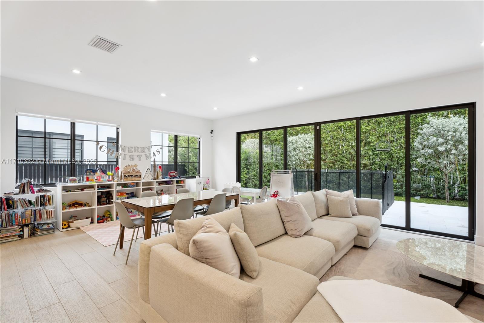 8391 Southwest 65th Avenue, Unit 8391 Miami, FL 33143 - Photo 2 of 24 a living room with furniture and a large window