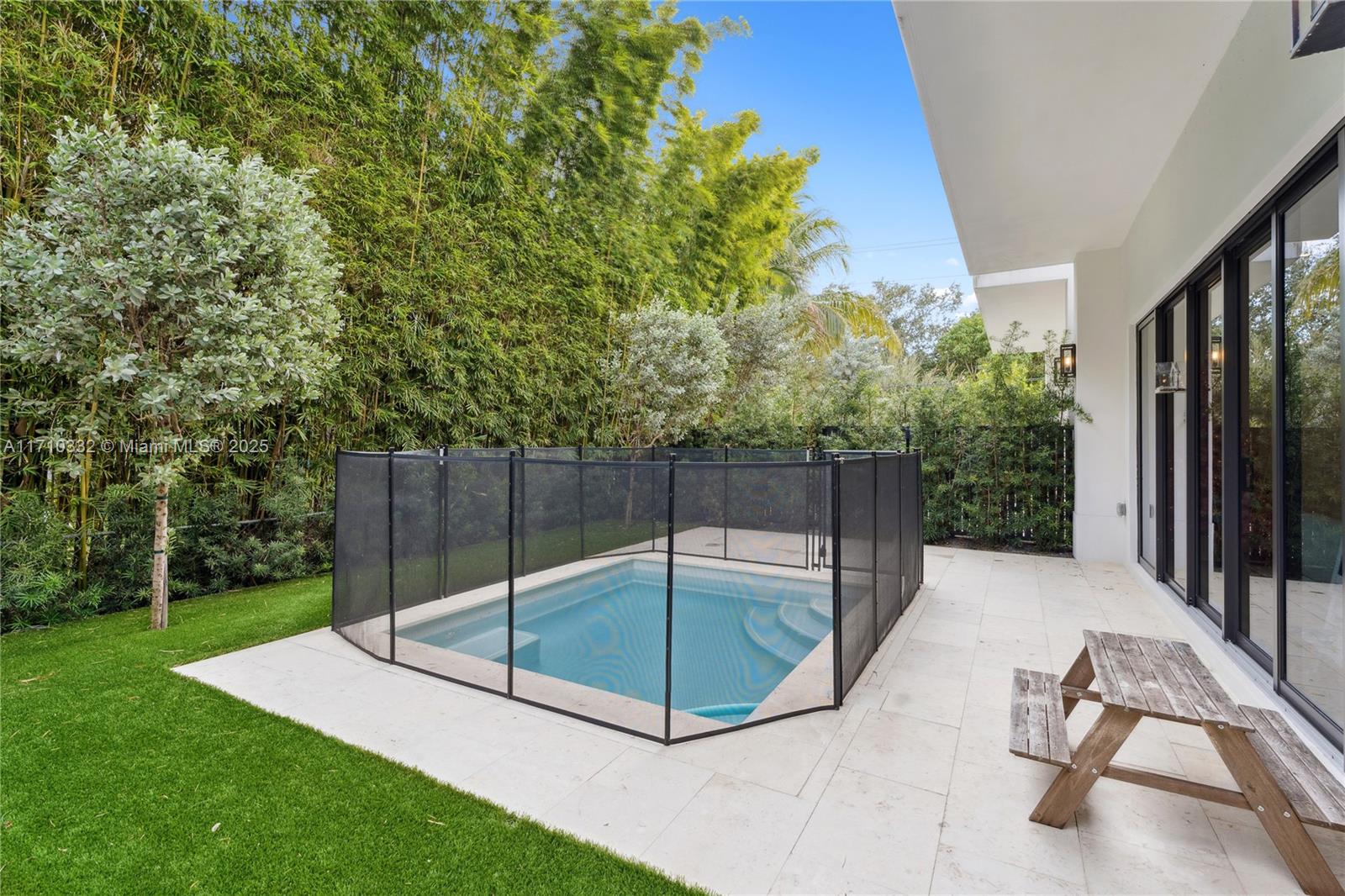 8391 Southwest 65th Avenue, Unit 8391 Miami, FL 33143 - Photo 23 of 24 a garden view with a backyard