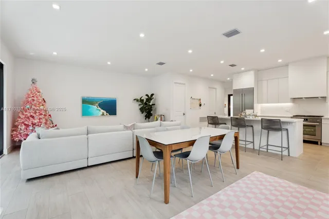 a view of a dining room with furniture