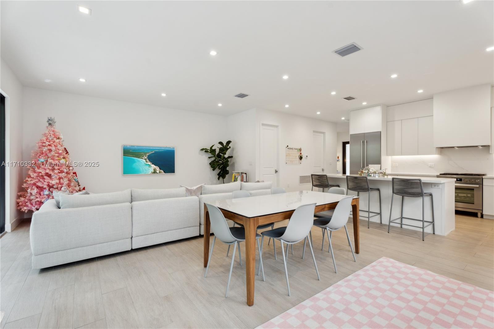 8391 Southwest 65th Avenue, Unit 8391 Miami, FL 33143 - Photo 6 of 24 a view of a dining room with furniture