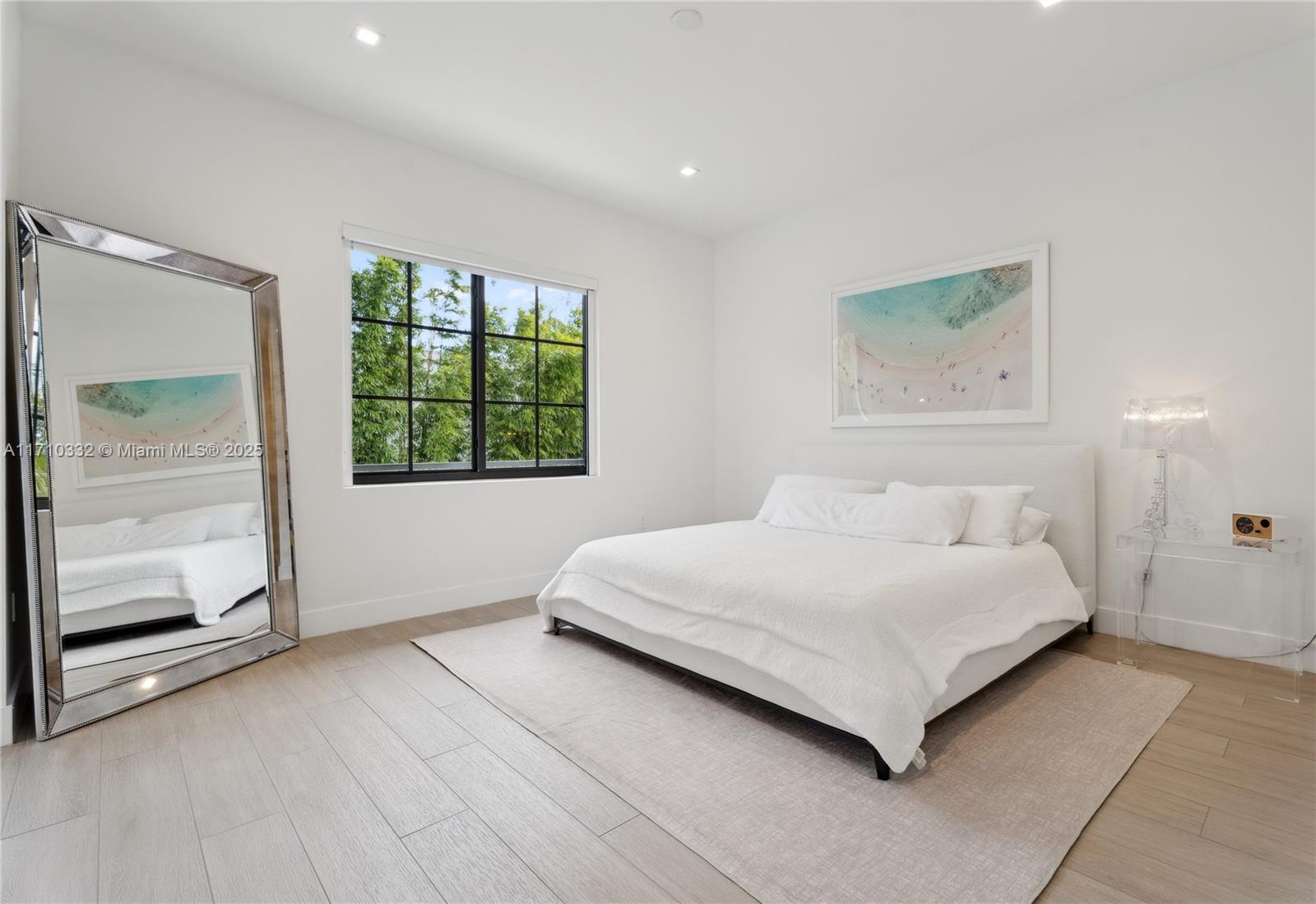 8391 Southwest 65th Avenue, Unit 8391 Miami, FL 33143 - Photo 9 of 24 a room with a bed and a window