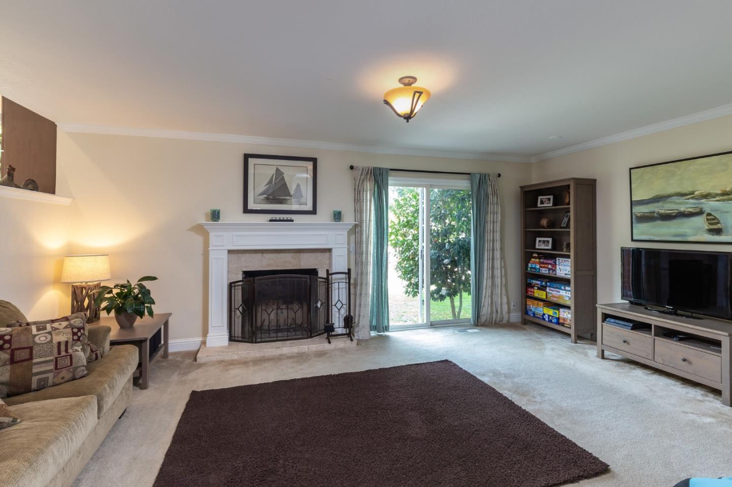 6593 Springpath Lane San Jose, CA 95120 - Photo 13 of 40 a living room with furniture and a fireplace
