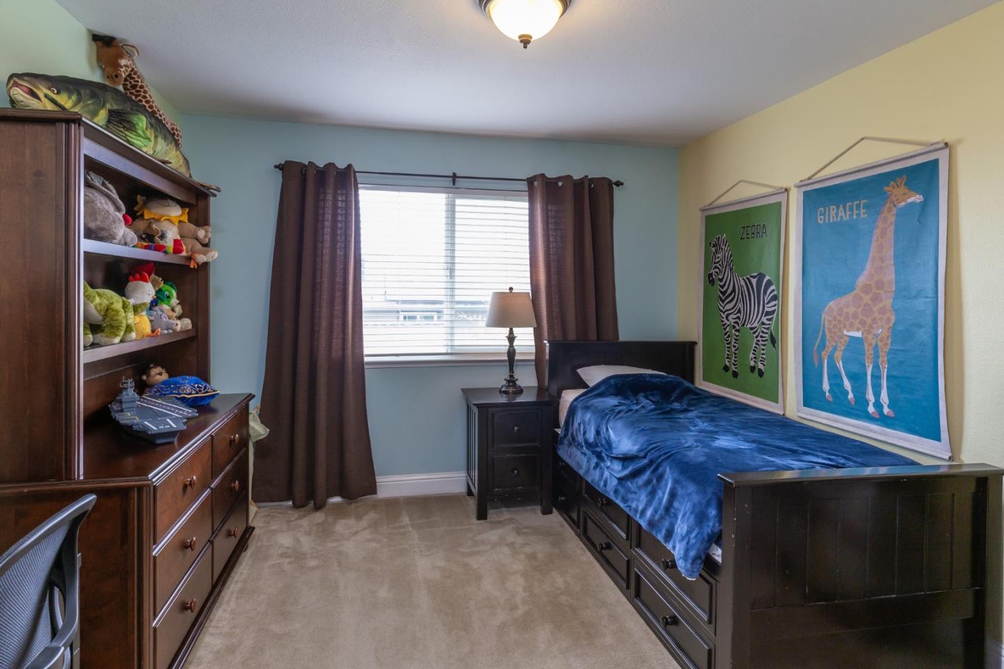 6593 Springpath Lane San Jose, CA 95120 - Photo 18 of 40 a bedroom with a bed and a window