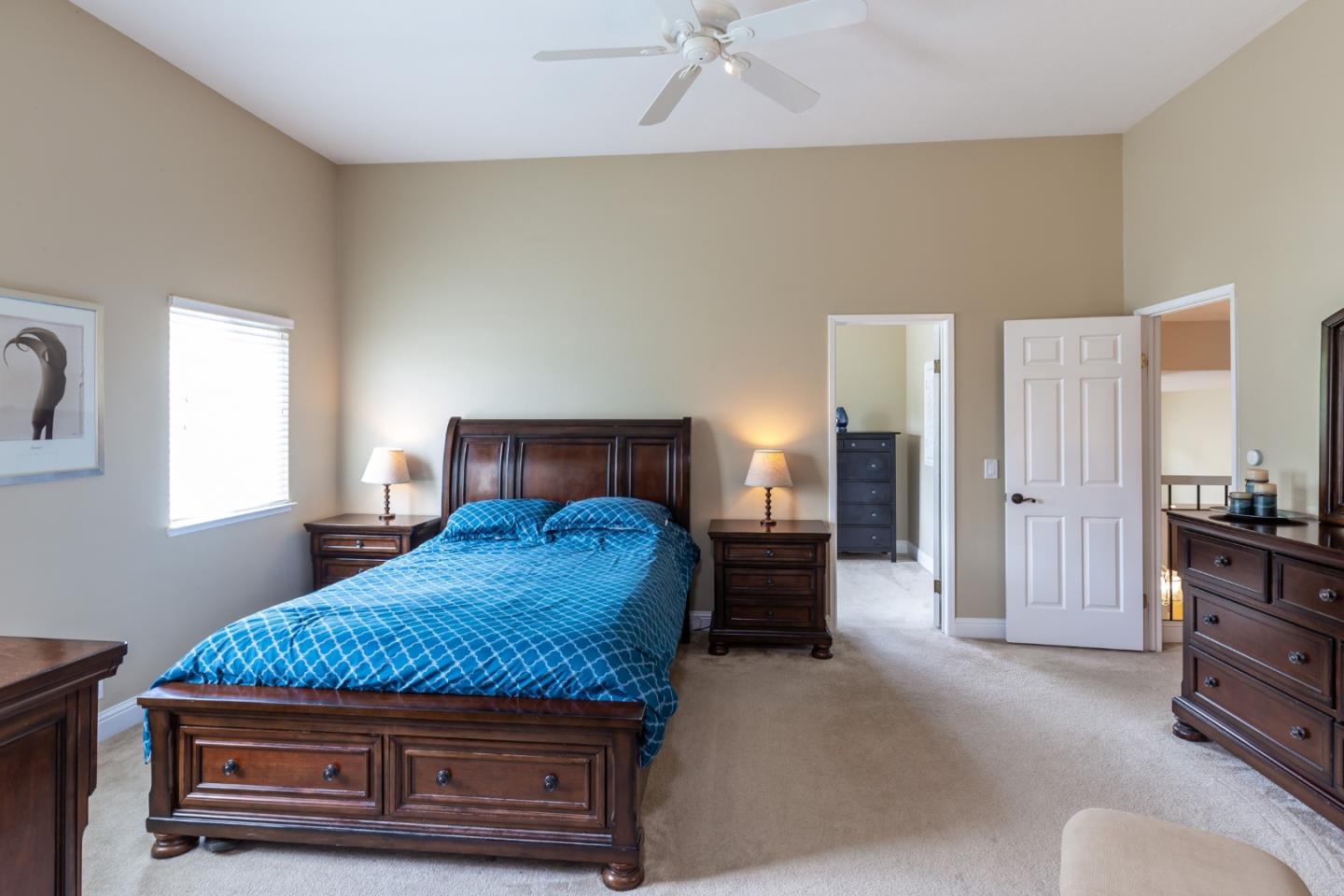 6593 Springpath Lane San Jose, CA 95120 - Photo 20 of 40 a bedroom with a bed and dresser
