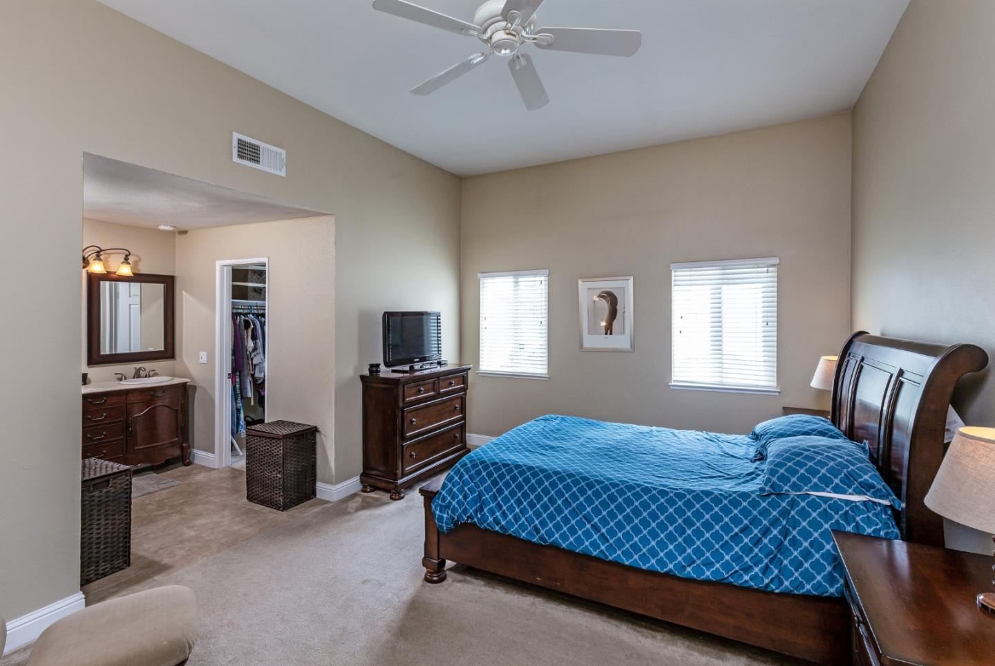6593 Springpath Lane San Jose, CA 95120 - Photo 21 of 40 a bedroom with a bed and furniture