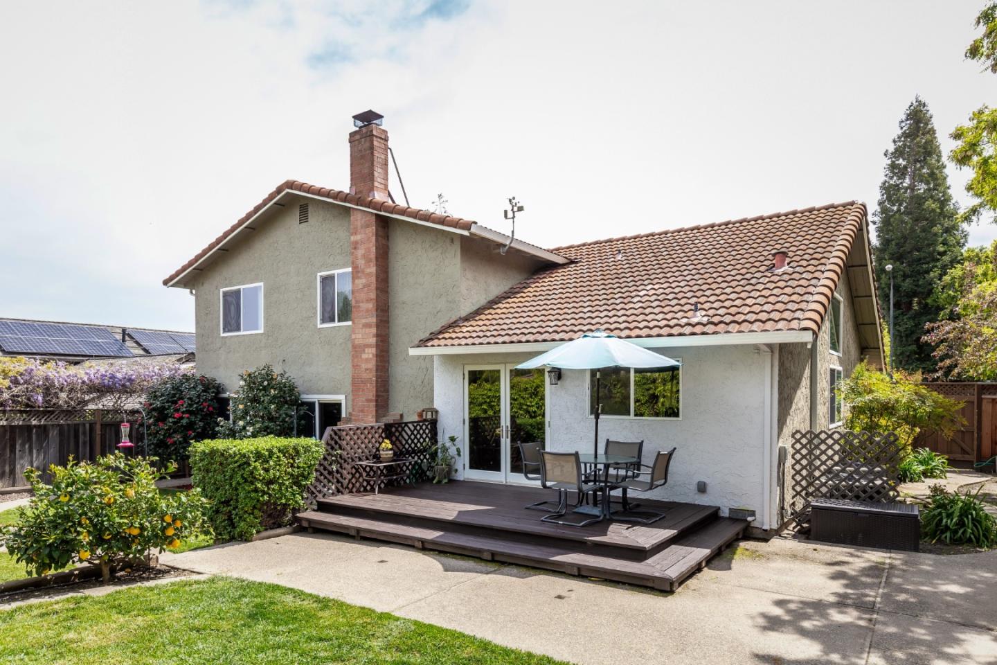 6593 Springpath Lane San Jose, CA 95120 - Photo 30 of 40 a front view of a house with a yard
