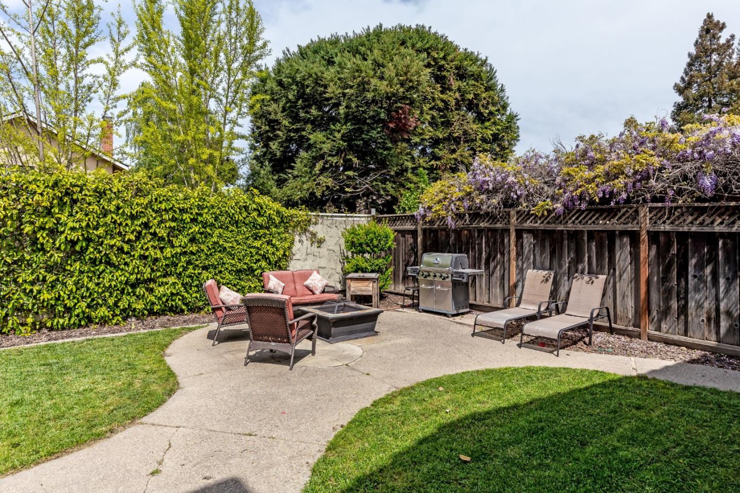 6593 Springpath Lane San Jose, CA 95120 - Photo 31 of 40 a view of a backyard with sitting area