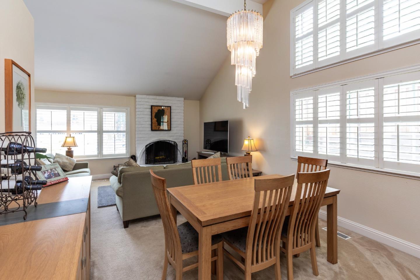 6593 Springpath Lane San Jose, CA 95120 - Photo 7 of 40 a living room with fireplace furniture and a large window