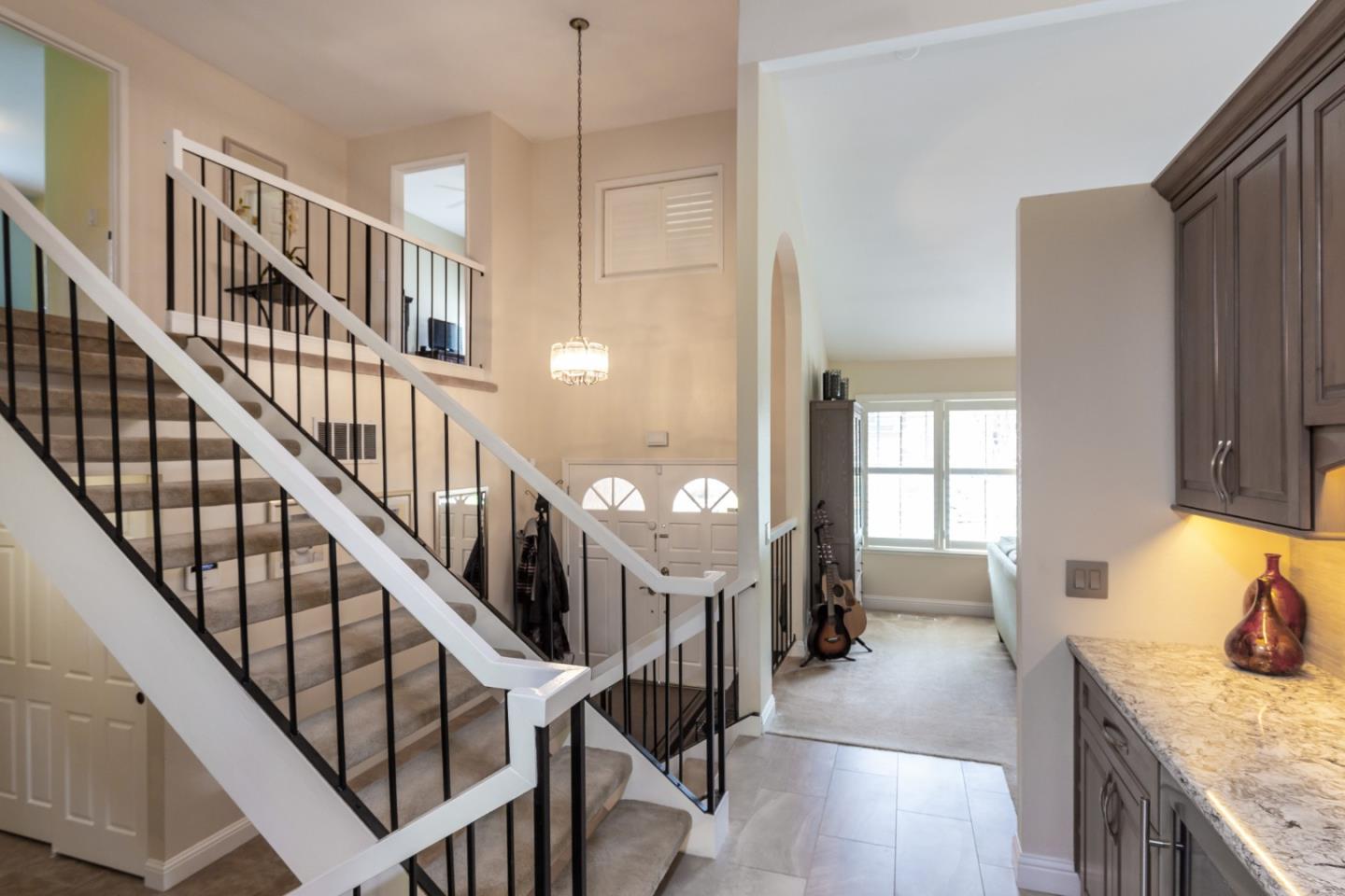 6593 Springpath Lane San Jose, CA 95120 - Photo 10 of 40 a view of entryway and hall with wooden floor