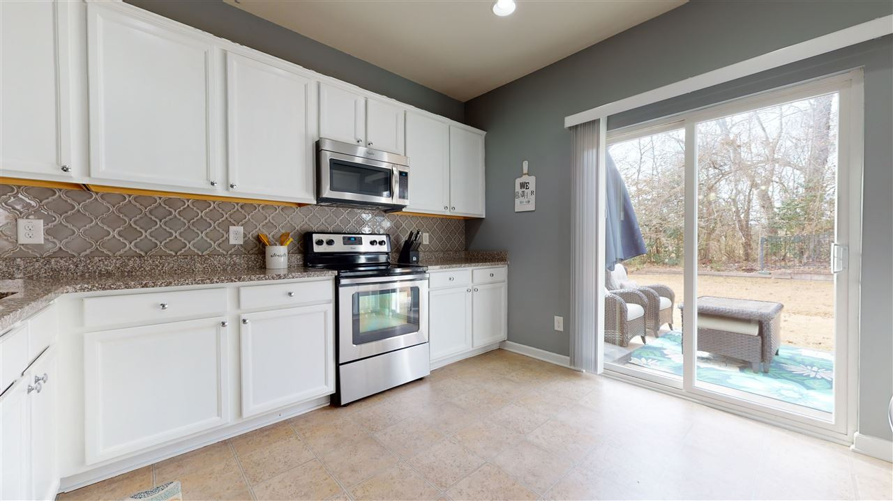 3612 Althorp Drive Raleigh, NC 27616 - Photo 6 of 30 Updated cabinets and kitchen backsplash