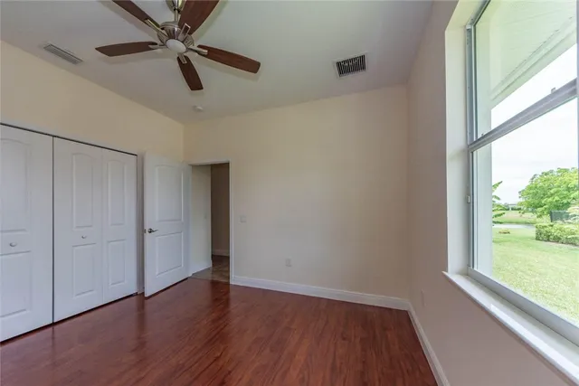 an empty room that has a window