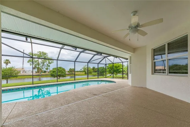 a view of a swimming pool with a porch