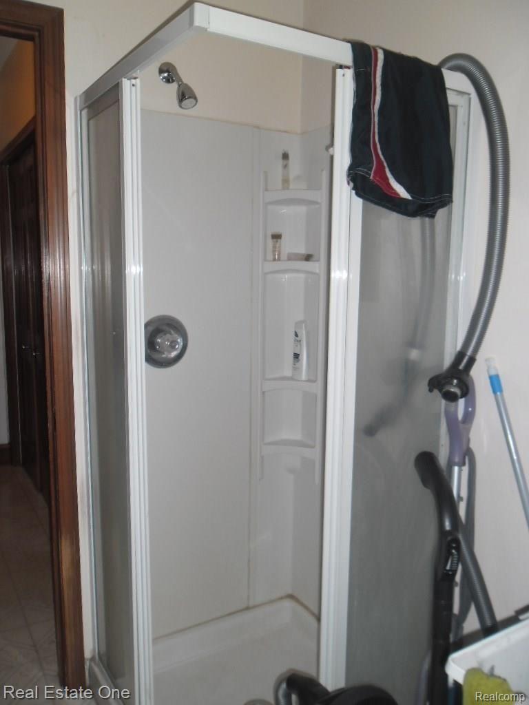 1419 Chevy Circuit Rochester, MI 48306 - Photo 35 of 49 Shower on main level of home near laundry.