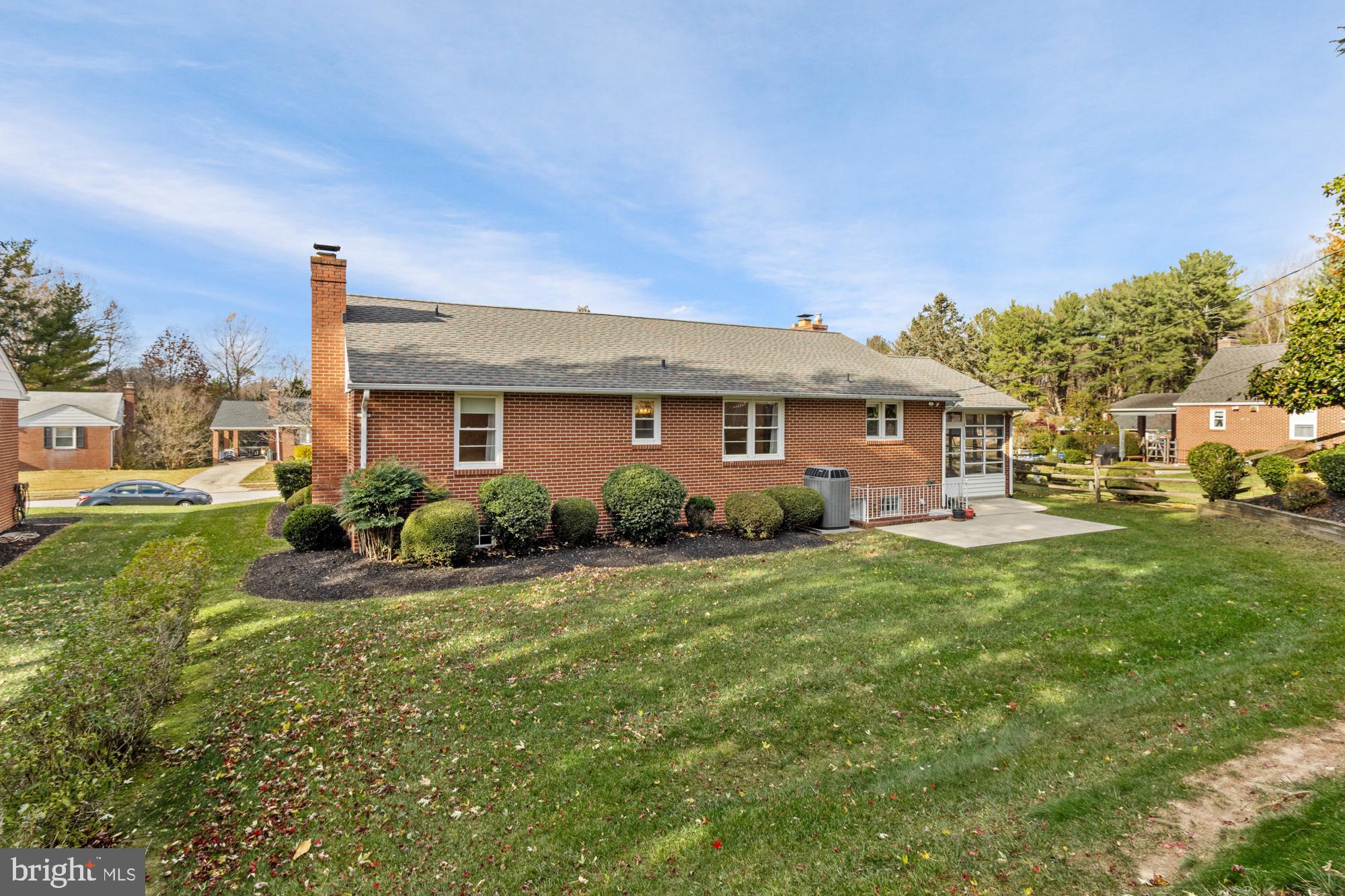 4302 Falls Park Road Perry Hall, MD 21128 - Photo 13 of 54 a front view of a house with a yard