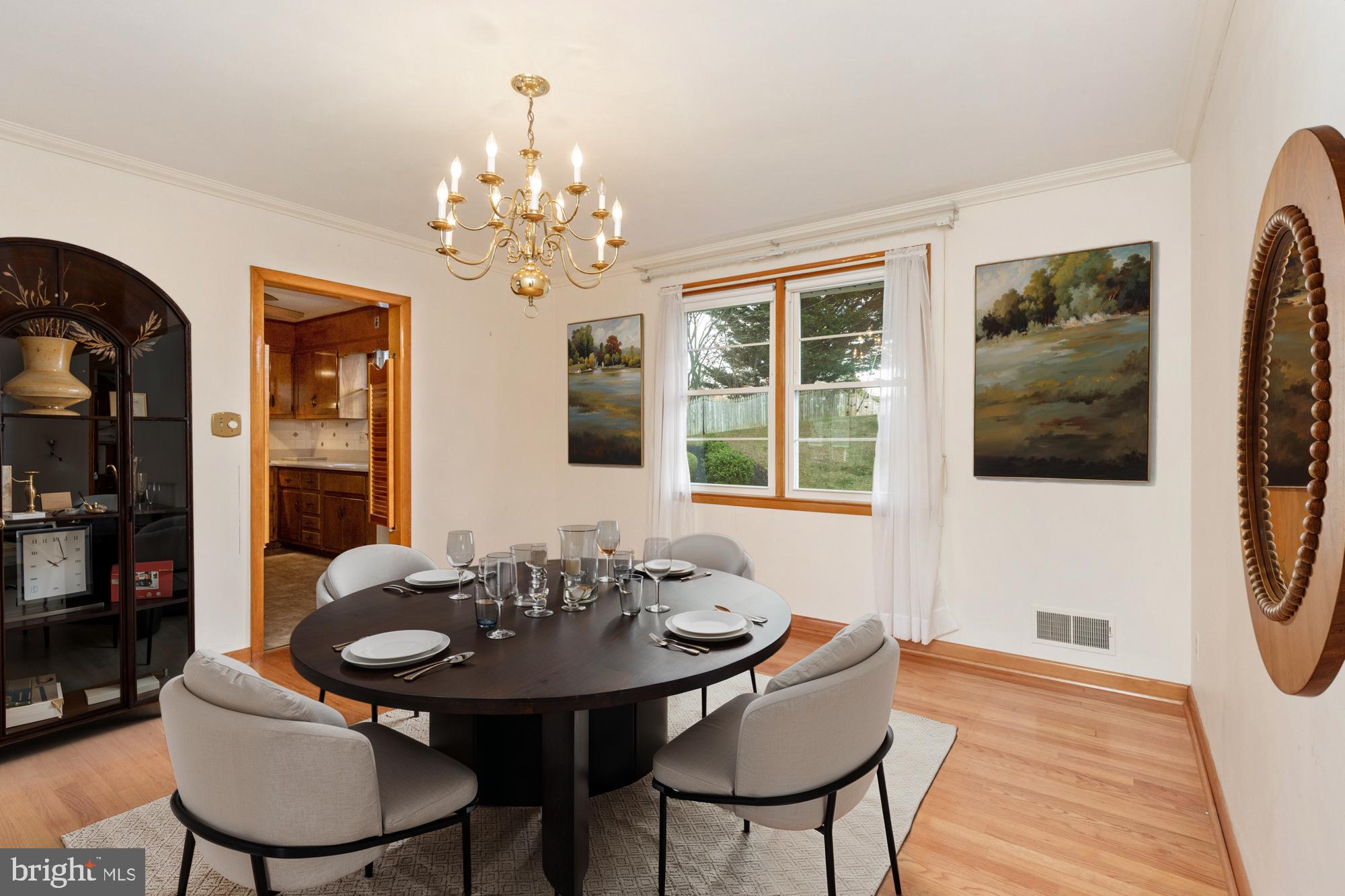 4302 Falls Park Road Perry Hall, MD 21128 - Photo 20 of 54 a view of a dining room with furniture window and wooden floor