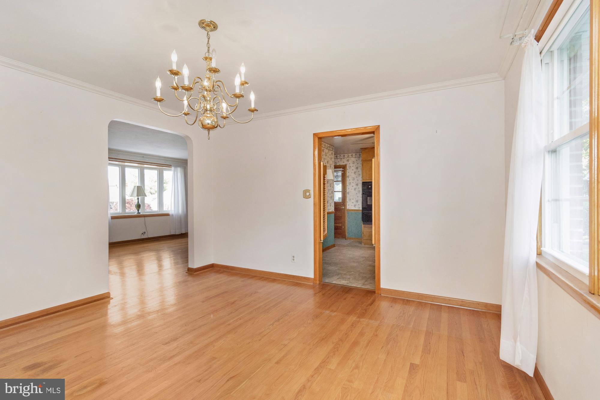 4302 Falls Park Road Perry Hall, MD 21128 - Photo 22 of 54 a view of an empty room with wooden floor and a window