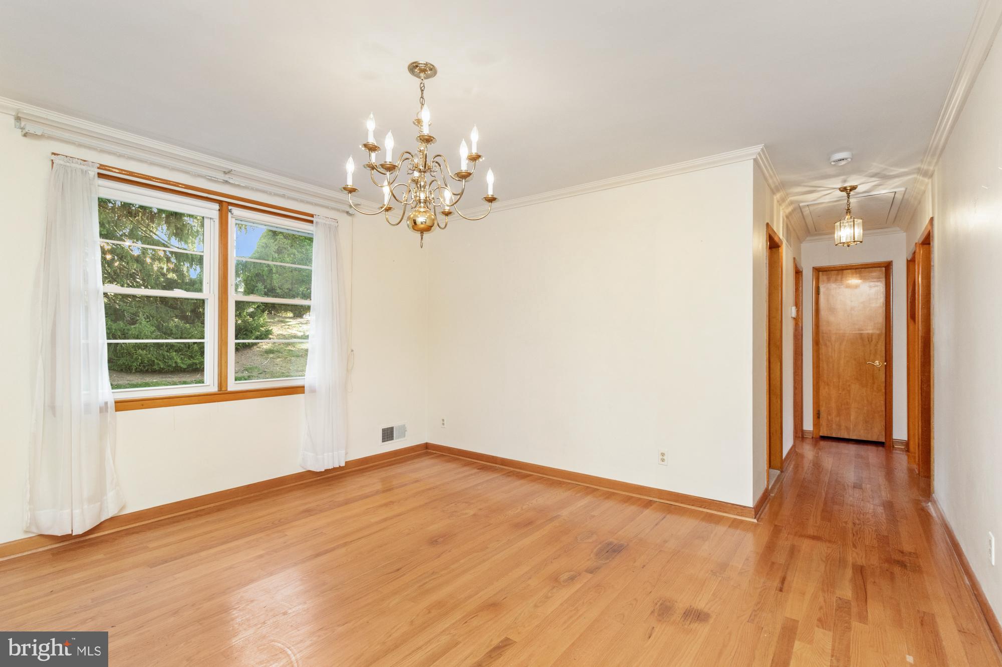 4302 Falls Park Road Perry Hall, MD 21128 - Photo 23 of 54 a view of empty room with wooden floor and fan