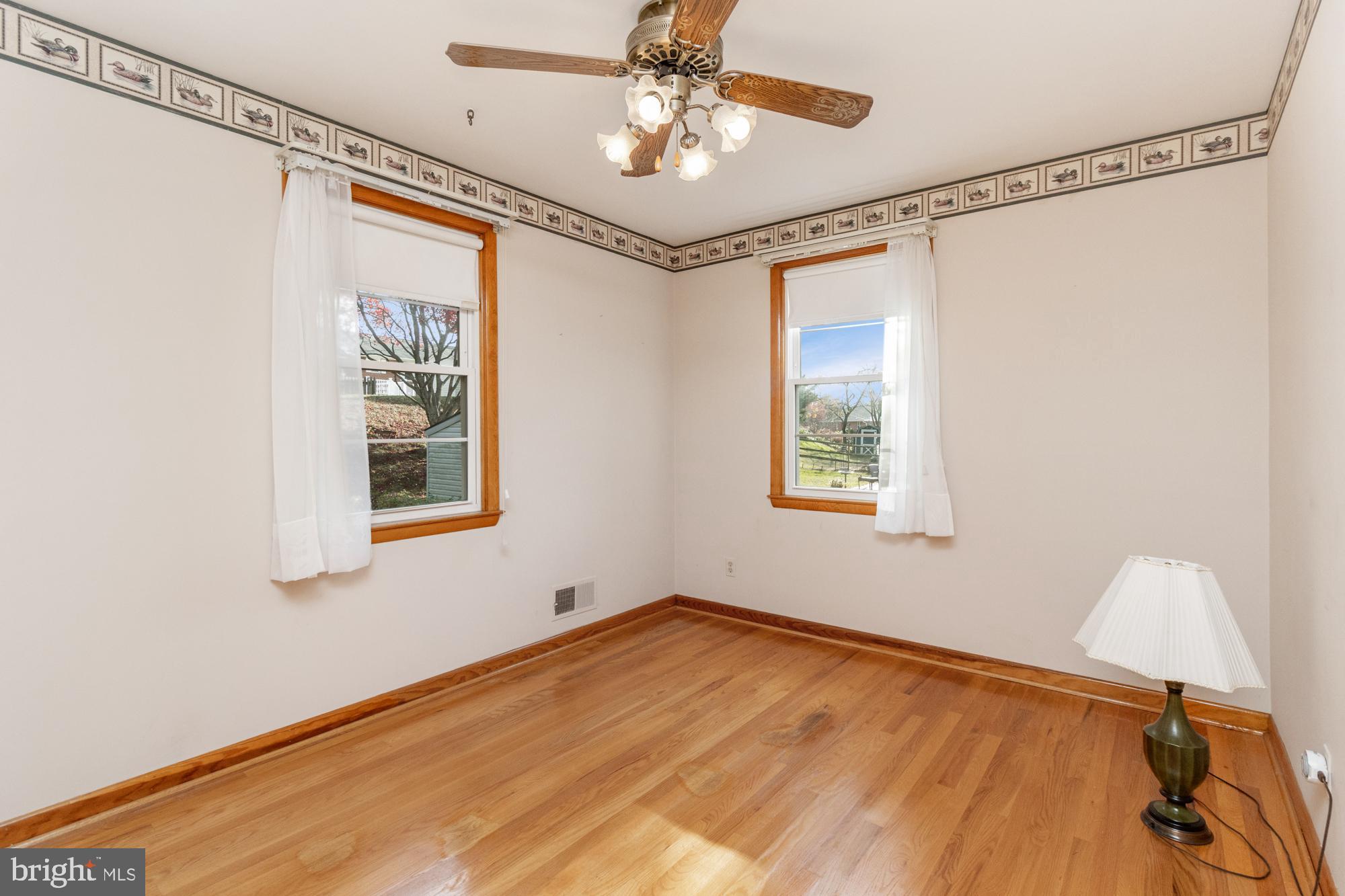 4302 Falls Park Road Perry Hall, MD 21128 - Photo 32 of 54 a view of an empty room with a window