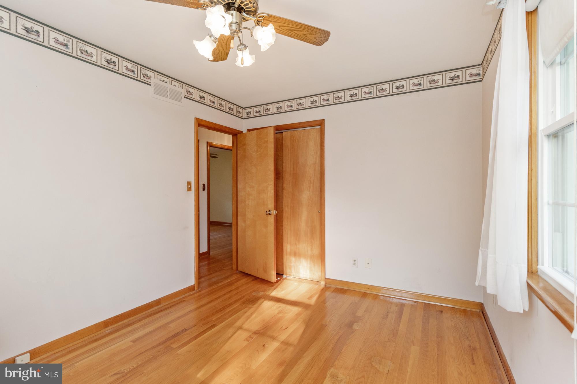 4302 Falls Park Road Perry Hall, MD 21128 - Photo 33 of 54 a view of an empty room with a window