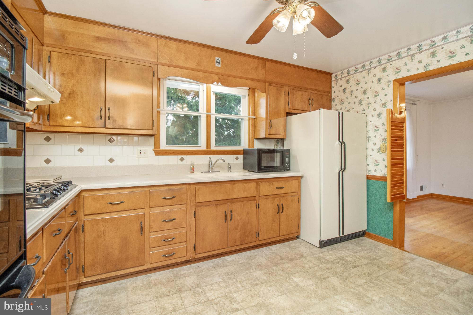 4302 Falls Park Road Perry Hall, MD 21128 - Photo 36 of 54 a spacious bathroom with a granite countertop sink and a large mirror
