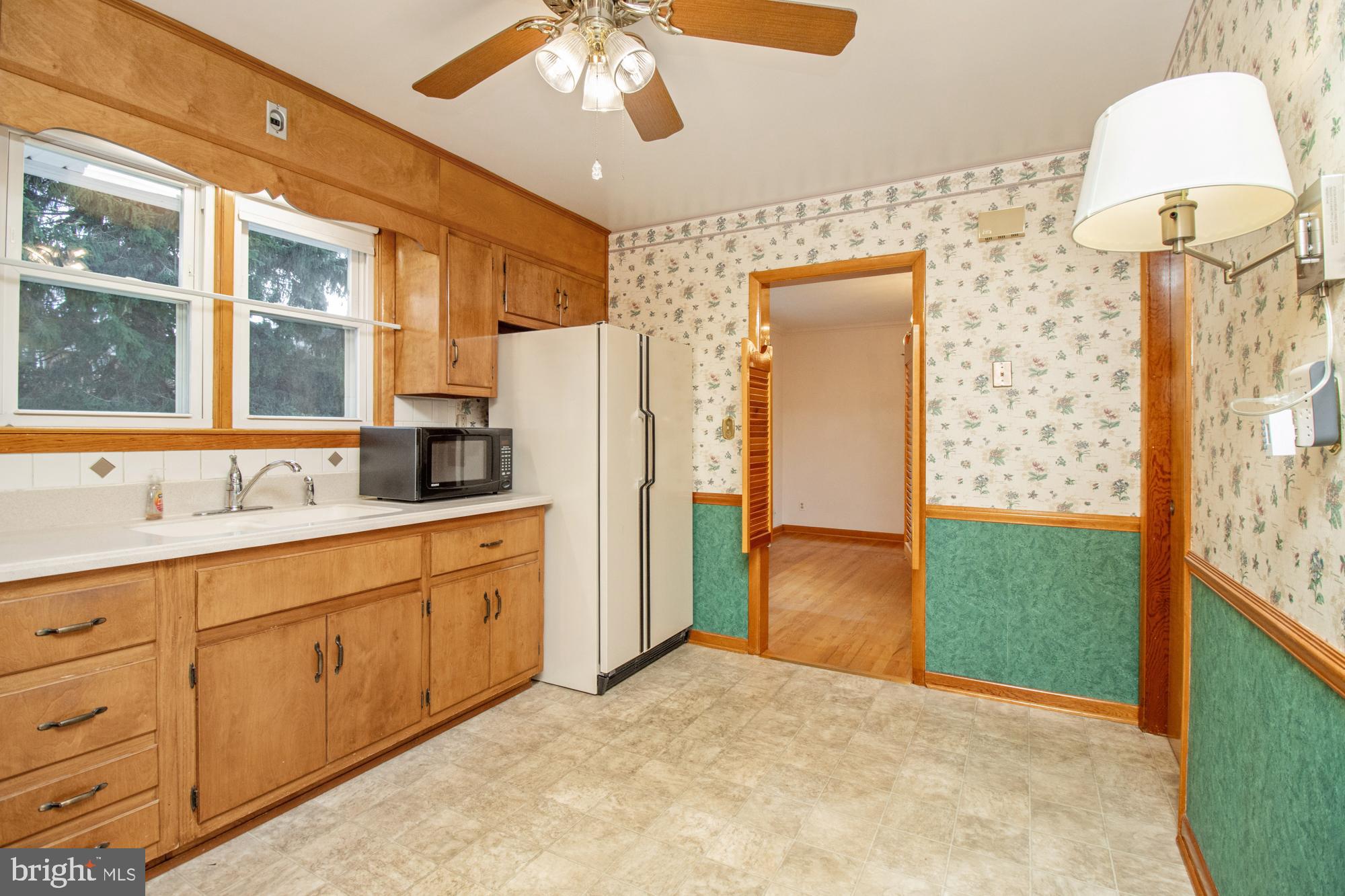4302 Falls Park Road Perry Hall, MD 21128 - Photo 37 of 54 a bathroom with a sink mirror and a shower