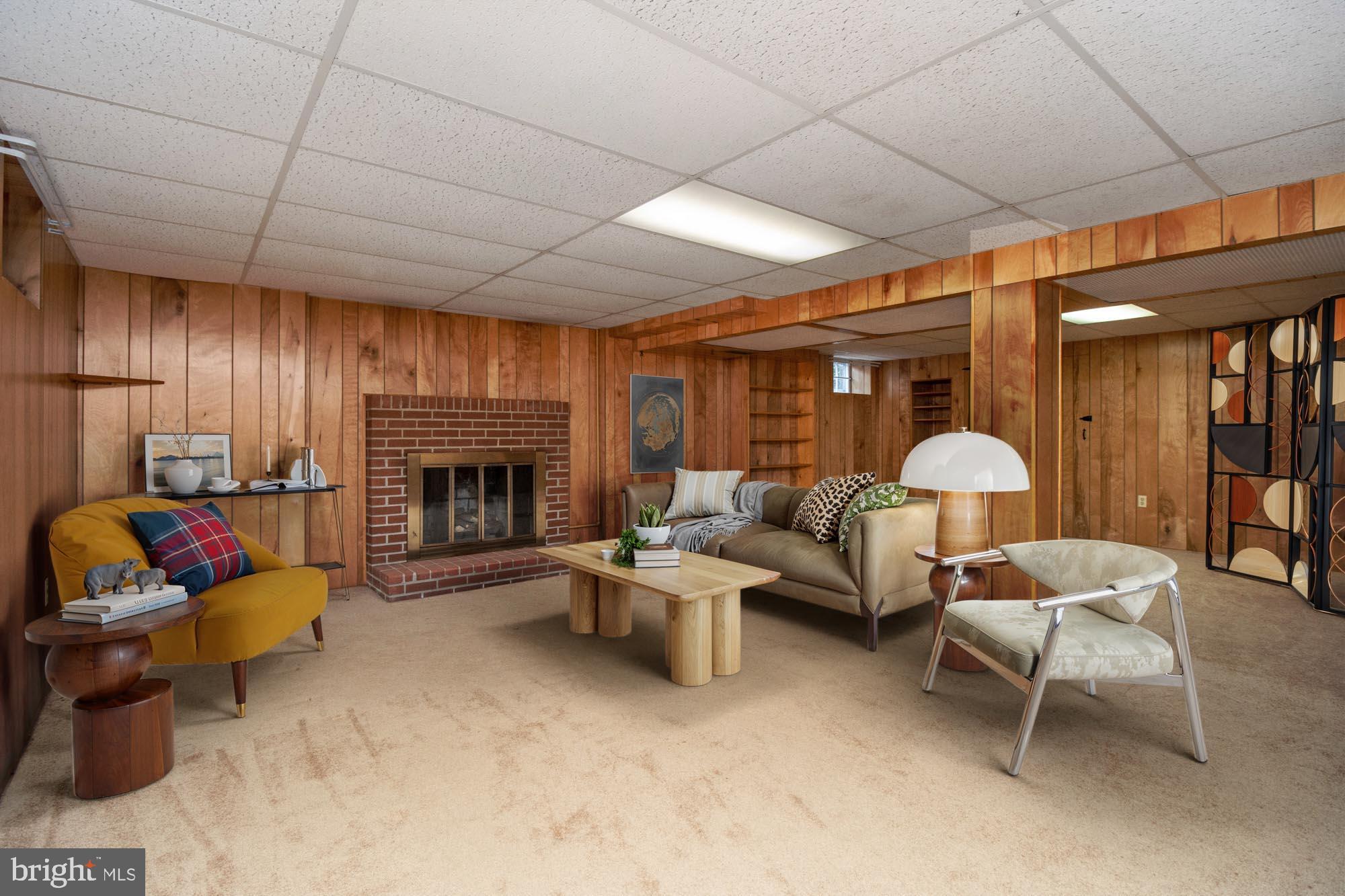 4302 Falls Park Road Perry Hall, MD 21128 - Photo 42 of 54 a living room with furniture and a fireplace
