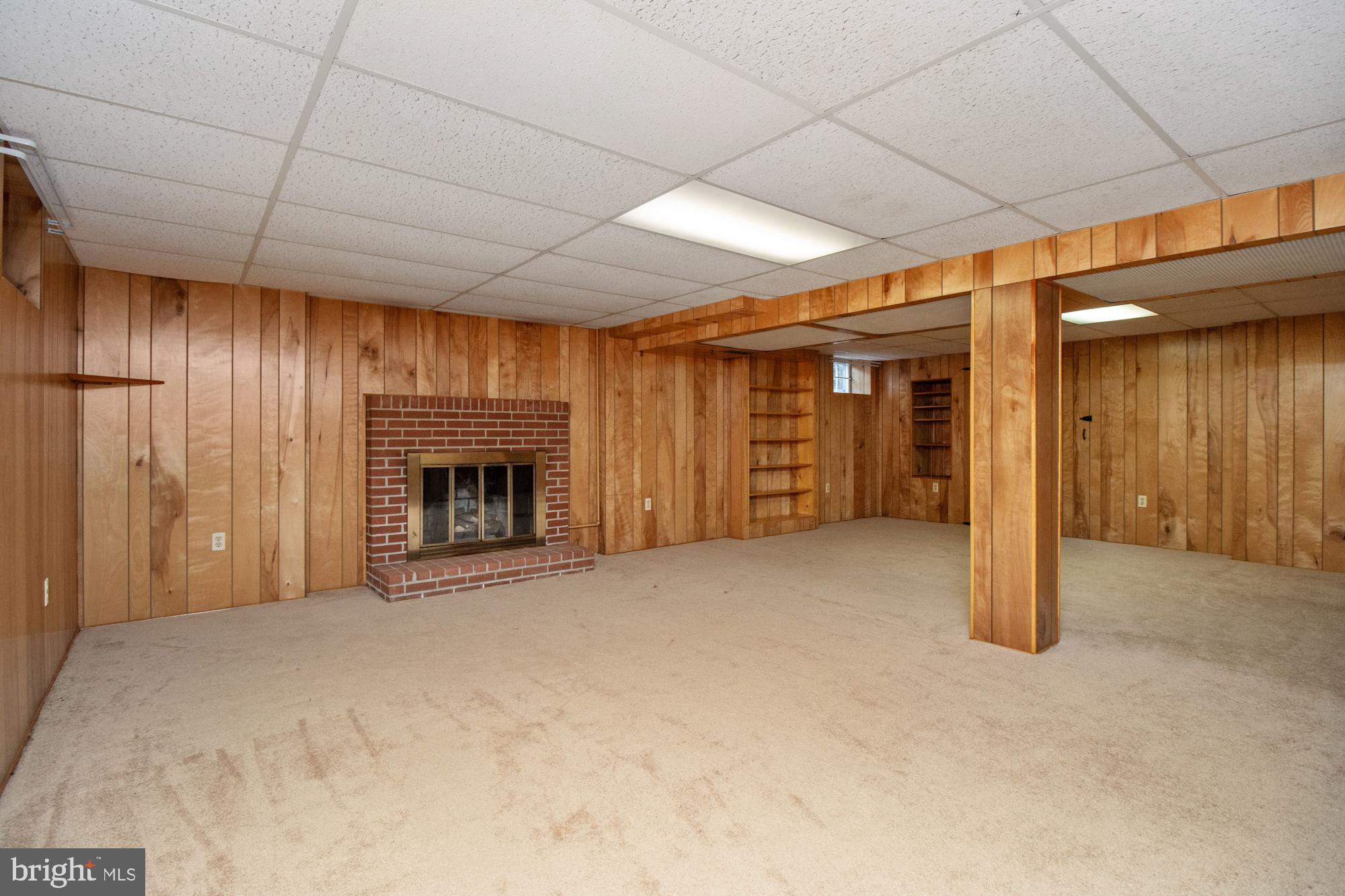 4302 Falls Park Road Perry Hall, MD 21128 - Photo 43 of 54 a view of an empty room with a fireplace