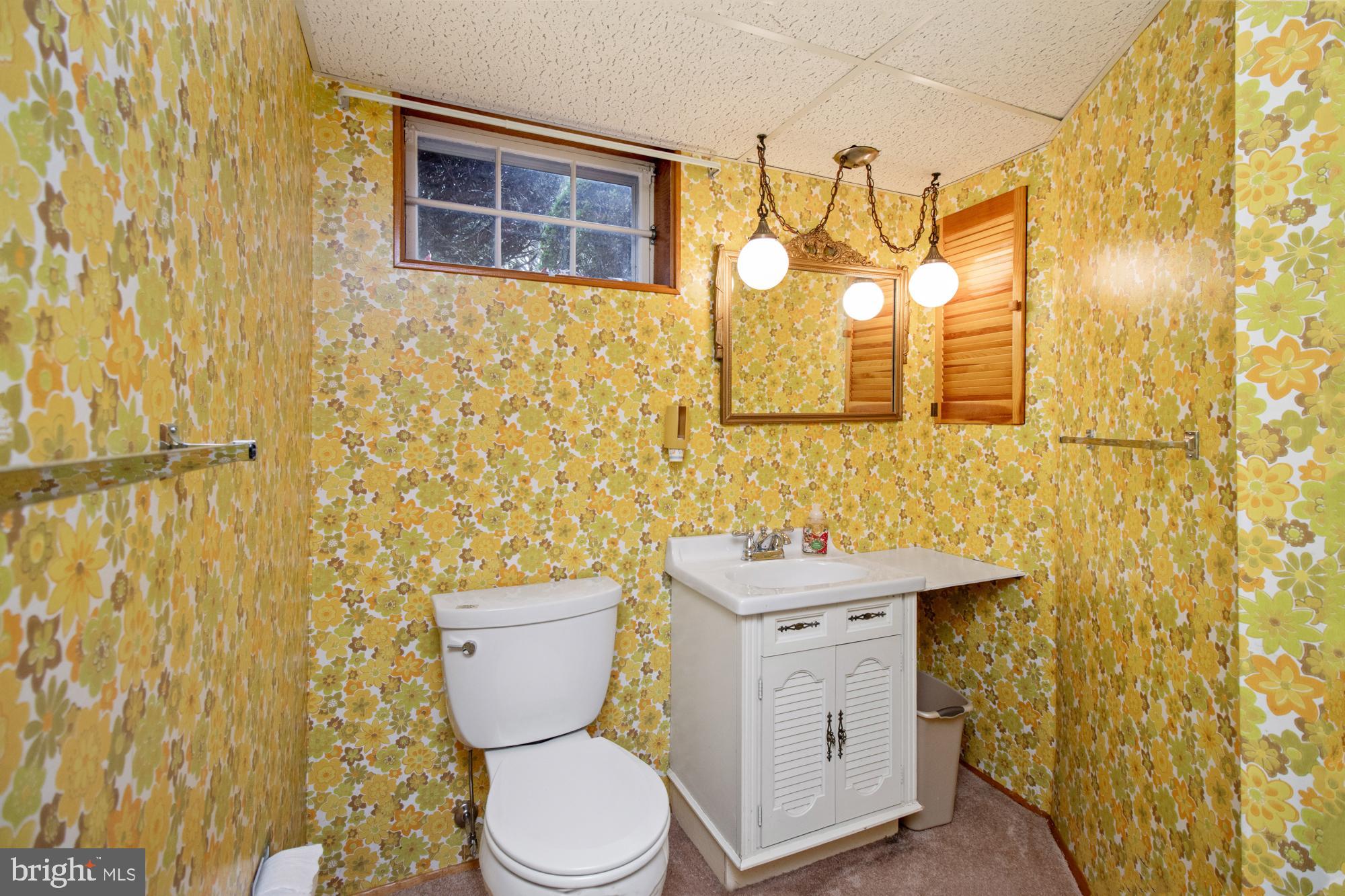 4302 Falls Park Road Perry Hall, MD 21128 - Photo 47 of 54 a bathroom with a sink mirror vanity and toilet