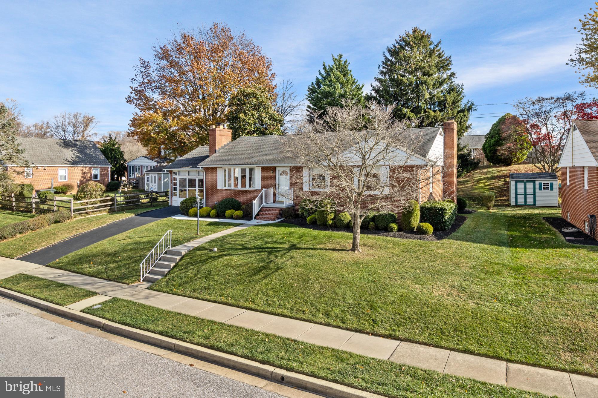 4302 Falls Park Road Perry Hall, MD 21128 - Photo 5 of 54 a view of a street and front view of a house