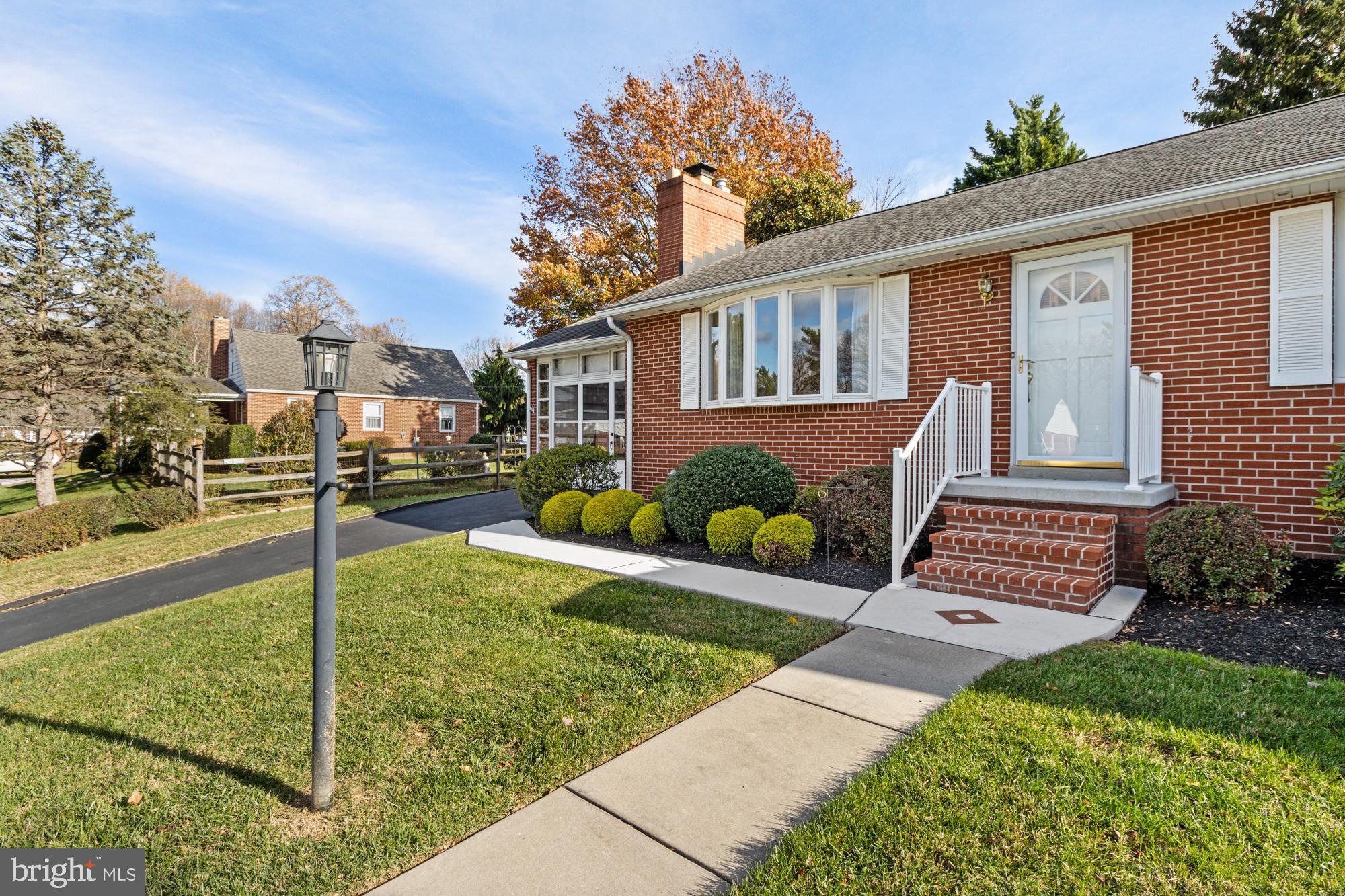 4302 Falls Park Road Perry Hall, MD 21128 - Photo 6 of 54 a view of a house with a yard