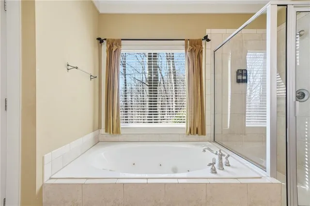 a bathroom with a sink a mirror and vanity